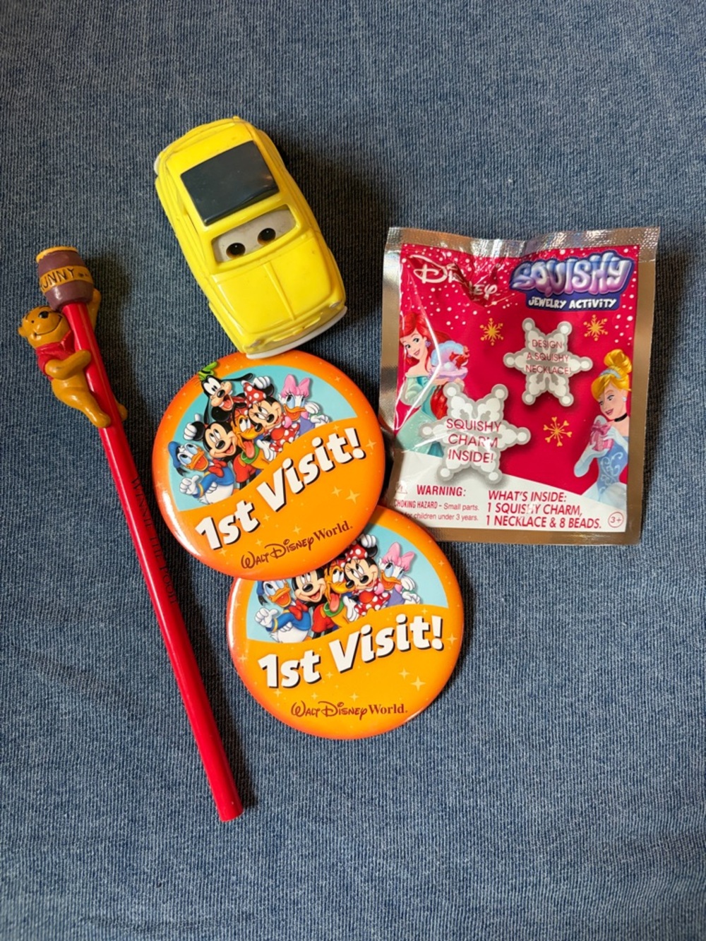 Disney Yellow Toy Car with Orange 1st Visit Buttons & Red Pooh Pencil